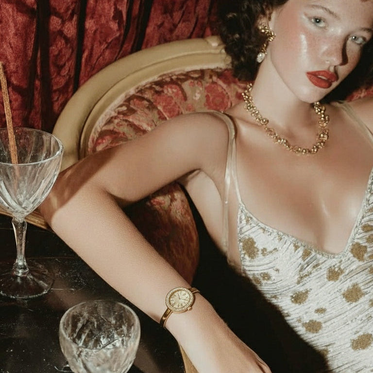 Woman in a vintage setting with drinks and a gold watch